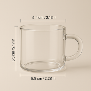 Clear glass mug with dimensions labeled on a beige background