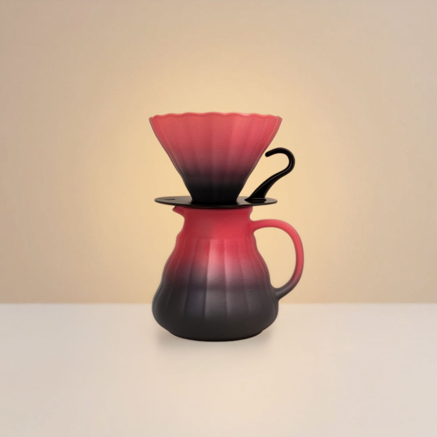 Red and black coffee dripper on a beige background