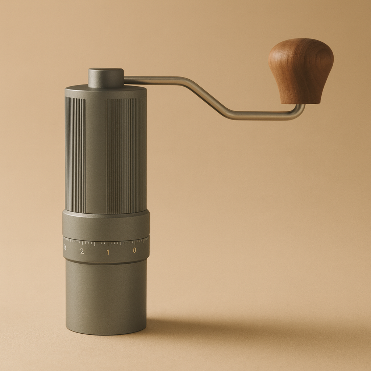 Hand coffee grinder with wooden handle on a beige background